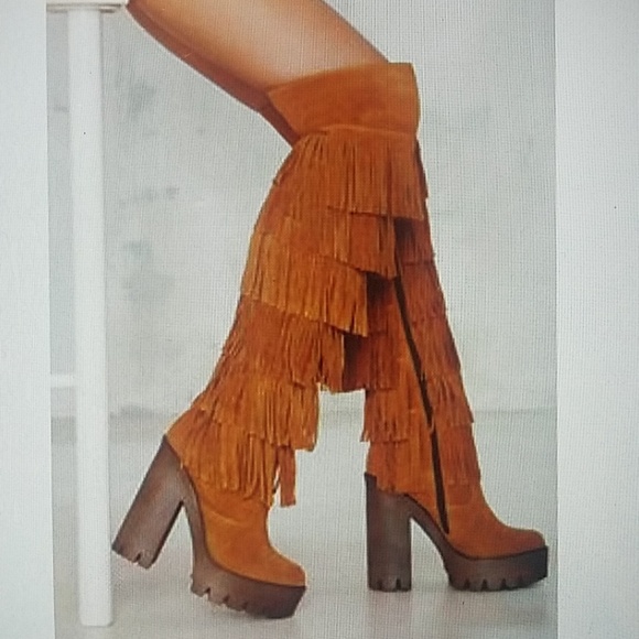 thigh high fringe boots